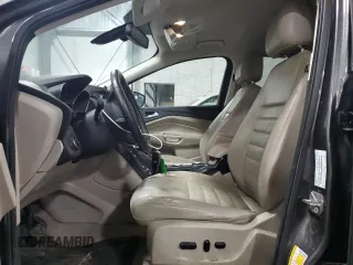 2015 Ford Escape Titanium with VIN 1FMCU9J90FUA26808, listed as a Copart auction lot 54449805 with 184,576 mi miles and Salvage title. Bid and sale history available at DreamBid. Image 7.