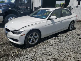 2014 BMW 3 Series 320i xDrive with VIN WBA3C3C51EF983592, listed as a Copart auction lot 60608765 with 195,061 mi miles and Salvage title. Bid and sale history available at DreamBid. Image 1.