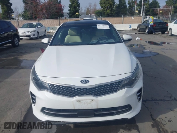 2016 Kia Optima SXL Turbo with VIN 5XXGV4L20GG074869, listed as a IAAI auction lot 41212808 with 82,884 mi miles. Bid and sale history available at carsss.com. Image 13.