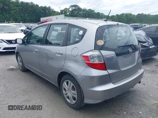 2010 Honda Fit z VIN JHMGE8H2XAS020698, wystawiony jako IAAI lot #42549063 z przebiegiem 260 454 mil mil oraz . Historia ofert i sprzedaży dostępna na DreamBid. Obrazek 3.