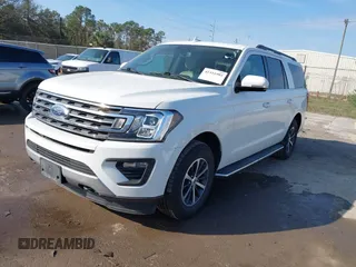 2021 Ford Expedition Max XLT with VIN 1FMJK1JT3MEA38310, listed as a IAAI auction lot 41511993 with 64,786 mi miles and . Bid and sale history available at DreamBid. Image 2.