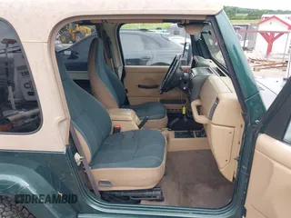 1999 Jeep Wrangler Sahara with VIN 1J4FY49S5XP482037, listed as a IAAI auction lot 42341723 with 161,081 mi miles and . Bid and sale history available at DreamBid. Image 5.