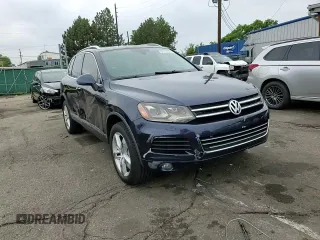 2011 Volkswagen Touareg Lux z VIN WVGFK9BP4BD001551, wystawiony jako Copart lot #58743065 z przebiegiem 142 661 mil mil oraz Szkoda całkowita • Salvage title. Historia ofert i sprzedaży dostępna na DreamBid. Obrazek 14.