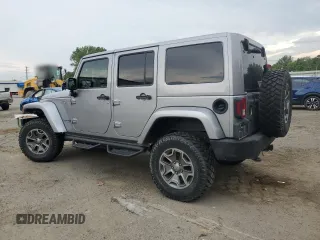 2018 Jeep Wrangler Unlimited Rubicon Recon z VIN 1C4HJWFGXJL840598, wystawiony jako Copart lot #59399595 z przebiegiem 63 298 mil mil oraz Szkoda całkowita • Salvage title. Historia ofert i sprzedaży dostępna na DreamBid. Obrazek 2.