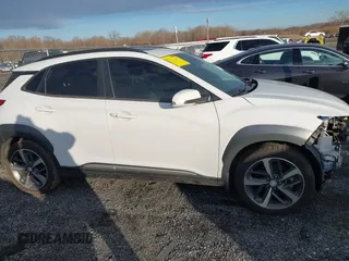 2019 Hyundai Kona Limited with VIN KM8K33A59KU371435, listed as a IAAI auction lot 41217772 with 72,454 mi miles. Bid and sale history available at carsss.com. Image 14.