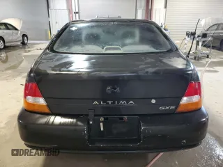 1998 Nissan Altima XE with VIN 1N4DL01D6WC151058, listed as a Copart auction lot 87671085 with 263,263 mi miles and Salvage Title. Bid and sale history available at carsss.com. Image 6.