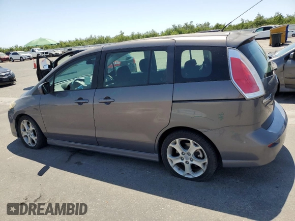2010 Mazda 5 Sport with VIN JM1CR2WL6A0368572, listed as a Copart auction lot 62604545 with 84,537 mi miles and Salvage title. Bid and sale history available at DreamBid. Image 2.