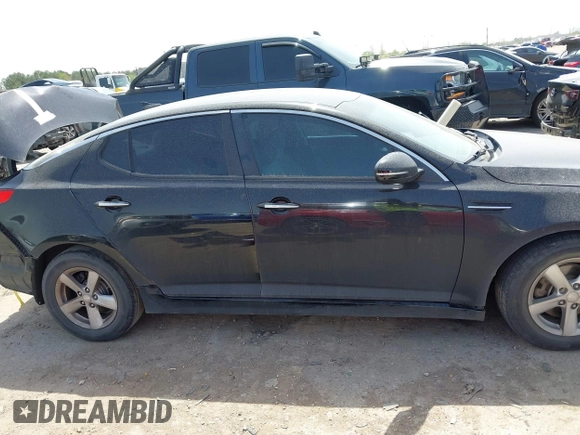 2015 Kia Optima LX z VIN 5XXGM4A75FG450983, wystawiony jako IAAI lot #41837815 z przebiegiem 95 187 mil mil oraz . Historia ofert i sprzedaży dostępna na DreamBid. Obrazek 13.