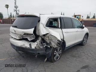 2016 Honda Pilot EX-L with VIN 5FNYF5H54GB037742, listed as a IAAI auction lot 41988112 with 68,459 mi miles and . Bid and sale history available at DreamBid. Image 4.