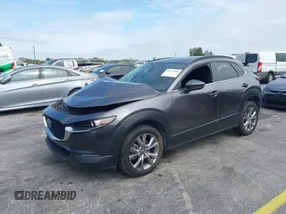 2021 Mazda CX-30 Preferred with VIN 3MVDMACLXMM228431, listed as a IAAI auction lot 41575602 with 67,854 mi miles. Bid and sale history available at carsss.com. Image 22.