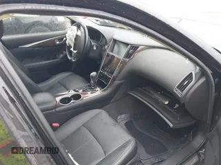2014 Infiniti Q50 Premium with VIN JN1BV7AR9EM685022, listed as a IAAI auction lot 39874056 with 95,980 mi miles and . Bid and sale history available at DreamBid. Image 5.