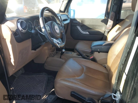 2014 Jeep Wrangler Unlimited Sahara with VIN 1C4BJWEG1EL109197, listed as a Copart auction lot 41699645 with 168,391 mi miles and Salvage Title. Bid and sale history available at carsss.com. Image 7.
