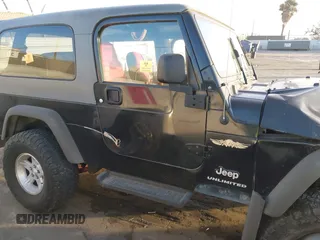 2005 Jeep Wrangler Unlimited with VIN 1J4FA44S35P314941, listed as a IAAI auction lot 41278276 with 248,865 mi miles. Bid and sale history available at carsss.com. Image 12.