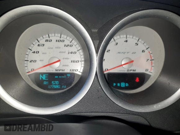 2006 Dodge Charger SRT-8 with VIN 2B3LA73W76H512508, listed as a Copart auction lot 86312114 with 177,592 mi miles and Salvage Title. Bid and sale history available at DreamBid. Image 9.