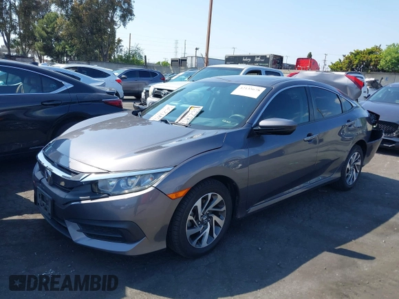 2016 Honda Civic EX with VIN 2HGFC2F74GH550780, listed as a IAAI auction lot 42135678 with 125,005 mi miles and . Bid and sale history available at DreamBid. Image 17.