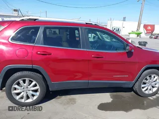 2015 Jeep Cherokee Limited with VIN 1C4PJMDB1FW599205, listed as a IAAI auction lot 41709308 with 112,415 mi miles. Bid and sale history available at carsss.com. Image 13.