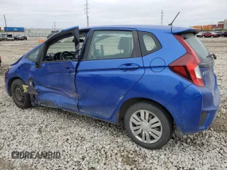2015 Honda Fit LX with VIN 3HGGK5G51FM718512, listed as a Copart auction lot 52790065 with 111,667 mi miles and Salvage title. Bid and sale history available at DreamBid. Image 2.
