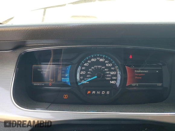 2015 Ford Taurus SEL with VIN 1FAHP2E8XFG209390, listed as a Copart auction lot 58992305 with 99,498 mi miles and Salvage title. Bid and sale history available at DreamBid. Image 9.