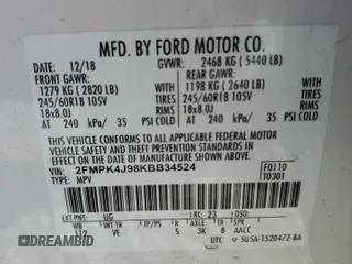 2019 Ford Edge SEL z VIN 2FMPK4J98KBB34524, wystawiony jako Copart lot #57313615 z przebiegiem 112 193 mil mil oraz Szkoda całkowita • Salvage title. Historia ofert i sprzedaży dostępna na DreamBid. Obrazek 13.
