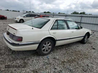 1995 Cadillac Seville Luxury SLS z VIN 1G6KS52Y7SU838169, wystawiony jako Copart lot #67941934 z przebiegiem 144 953 mil mil oraz Szkoda całkowita • Salvage title. Historia ofert i sprzedaży dostępna na DreamBid. Obrazek 3.