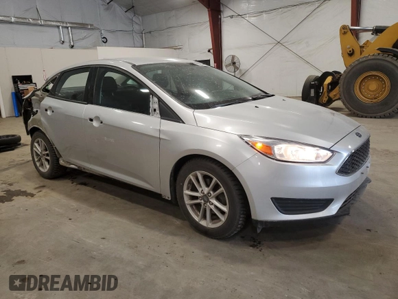 2018 Ford Focus SE z VIN 1FADP3F24JL315154, wystawiony jako Copart lot #53609185 z przebiegiem 76 216 mil mil oraz Szkoda całkowita • Salvage title. Historia ofert i sprzedaży dostępna na DreamBid. Obrazek 4.