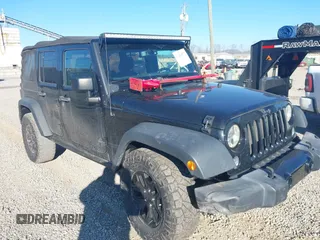 2016 Jeep Wrangler Unlimited Sport with VIN 1C4BJWDG0GL123581, listed as a IAAI auction lot 41426577 with 102,301 mi miles and . Bid and sale history available at DreamBid. Image 1.