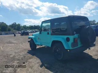 2002 Jeep Wrangler Sahara с VIN 1J4FA59S62P768112, выставлен на аукционе IAAI как лот 42657738 с пробегом 196 571 миль миль и . История ставок и продаж доступна на DreamBid. Изображение 3.