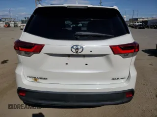 2019 Toyota Highlander SE z VIN 5TDJZRFH3KS943706, wystawiony jako Copart lot #51982925 z przebiegiem 62 596 mil mil oraz Szkoda całkowita • Salvage title. Historia ofert i sprzedaży dostępna na DreamBid. Obrazek 6.
