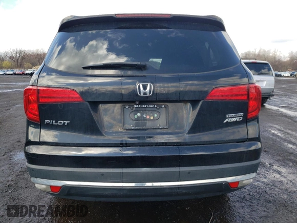 2017 Honda Pilot Touring with VIN 5FNYF6H90HB028112, listed as a Copart auction lot 52197645 with 218,944 mi miles and Salvage Title. Bid and sale history available at DreamBid. Image 6.