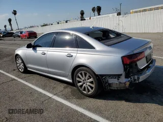 2016 Audi A6 2.0T Premium Plus with VIN WAUGFAFC2GN124981, listed as a Copart auction lot 43656653 with 74,400 mi miles. Bid and sale history available at carsss.com. Image 2.