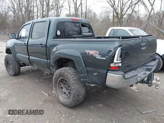 2011 Toyota Tacoma with VIN 5TFLU4EN0BX021583, listed as a IAAI auction lot 41937302 with 249,251 mi miles. Bid and sale history available at carsss.com. Image 3.