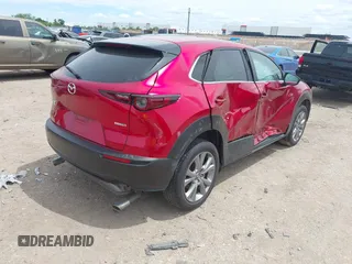 2021 Mazda CX-30 Preferred with VIN 3MVDMBCL6MM243479, listed as a IAAI auction lot 42226356 with 38,628 mi miles and . Bid and sale history available at DreamBid. Image 4.