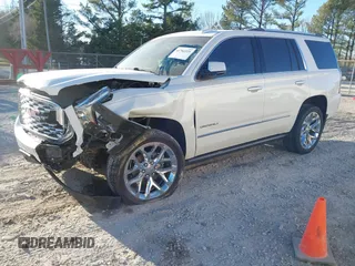 2018 GMC Yukon Denali with VIN 1GKS2CKJ4JR218924, listed as a IAAI auction lot 41702225 with 114,719 mi miles. Bid and sale history available at carsss.com. Image 17.