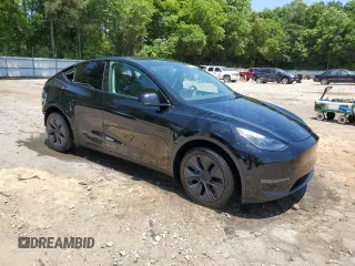 2024 Tesla Model Y z VIN 7SAYGDED2RA329802, wystawiony jako Copart lot #57748805 z przebiegiem 19 391 mil mil oraz Szkoda całkowita • Salvage title. Historia ofert i sprzedaży dostępna na DreamBid. Obrazek 4.