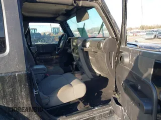 2009 Jeep Wrangler Rubicon with VIN 1J8GA641X9L706706, listed as a IAAI auction lot 41520129 with 176,345 mi miles. Bid and sale history available at carsss.com. Image 5.