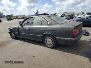 1994 BMW 5 Series 525i z VIN WBAHD632XRGK40231, wystawiony jako Copart lot #59364145 z przebiegiem Nie podano mil oraz Czysty tytuł • Clean title. Historia ofert i sprzedaży dostępna na DreamBid. Obrazek 2.