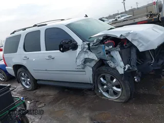 2009 Chevrolet Tahoe LTZ with VIN 1GNFK33079R293963, listed as a IAAI auction lot 41662695 with 185,408 mi miles and . Bid and sale history available at DreamBid. Image 13.