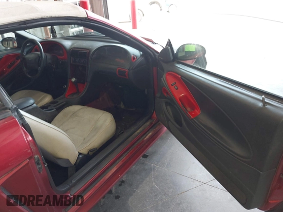 2003 Ford Mustang Deluxe z VIN 1FAFP44403F407592, wystawiony jako IAAI lot #42409746 z przebiegiem 211 269 mil mil oraz . Historia ofert i sprzedaży dostępna na DreamBid. Obrazek 5.