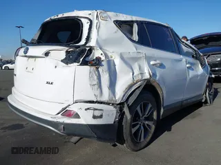 2018 Toyota RAV4 XLE with VIN 2T3WFREV3JW484955, listed as a IAAI auction lot 42262089 with 118,527 mi miles and . Bid and sale history available at DreamBid. Image 4.