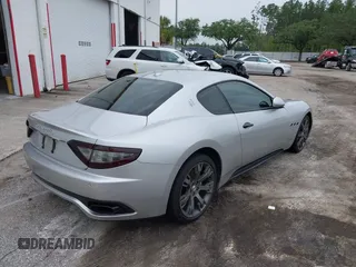 2013 Maserati GranTurismo Sport with VIN ZAM45VLA8D0072490, listed as a IAAI auction lot 42438872 with 84,214 mi miles and . Bid and sale history available at DreamBid. Image 4.