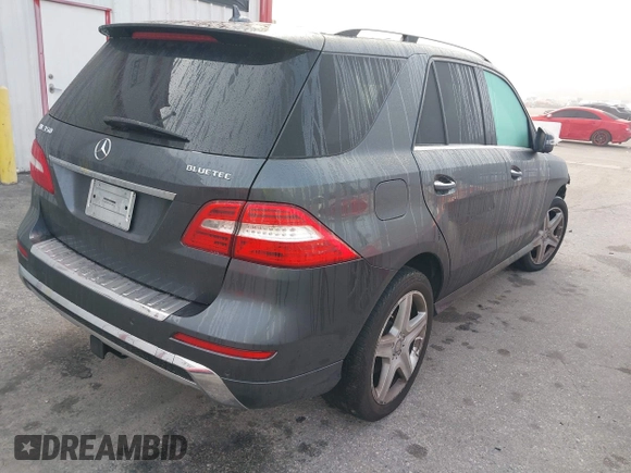 2014 Mercedes-Benz M 350 with VIN 4JGDA2EB2EA307963, listed as a IAAI auction lot 41582162 with 54,963 mi miles and . Bid and sale history available at DreamBid. Image 4.