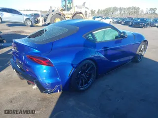 2023 Toyota GR Supra 3.0 with VIN WZ1DB0G01PW057818, listed as a IAAI auction lot 41405386 with NaN miles. Bid and sale history available at carsss.com. Image 4.