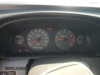 2000 Nissan Frontier XE z VIN 1N6ED26Y7YC392971, wystawiony jako Copart lot #61301035 z przebiegiem 182 149 mil mil oraz Czysty tytuł • Clean title. Historia ofert i sprzedaży dostępna na DreamBid. Obrazek 9.