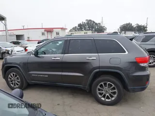 2014 Jeep Grand Cherokee Limited with VIN 1C4RJEBG0EC555774, listed as a IAAI auction lot 42160952 with 102,076 mi miles and . Bid and sale history available at DreamBid. Image 14.