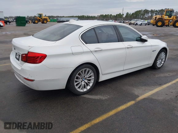 2015 BMW 5 Series 528i with VIN WBA5A5C5XFD516999, listed as a IAAI auction lot 41195184 with 131,187 mi miles. Bid and sale history available at carsss.com. Image 4.