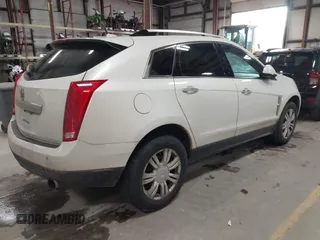 2011 Cadillac SRX Luxury Collection with VIN 3GYFNDEY1BS548452, listed as a IAAI auction lot 41476690 with 156,922 mi miles and . Bid and sale history available at carsss.com. Image 4.