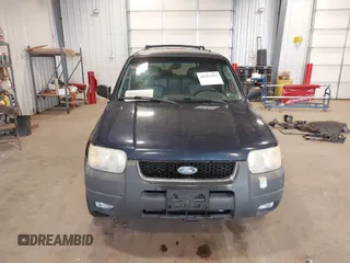 2004 Ford Escape XLT with VIN 1FMYU93134KB36712, listed as a IAAI auction lot 42412101 with 232,340 mi miles and . Bid and sale history available at DreamBid. Image 12.