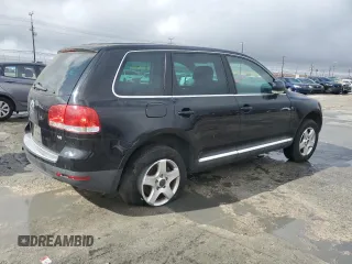 2005 Volkswagen Touareg z VIN WVGZG77LX5D063808, wystawiony jako Copart lot #44457935 z przebiegiem 172 252 mil mil oraz Czysty tytuł • Clean title. Historia ofert i sprzedaży dostępna na DreamBid. Obrazek 3.