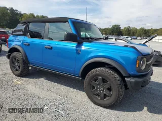 2024 Ford Bronco with VIN 1FMDE1BH6RLA31465, listed as a Copart auction lot 74325424 with 15,627 mi miles and Salvage title. Bid and sale history available at DreamBid. Image 4.