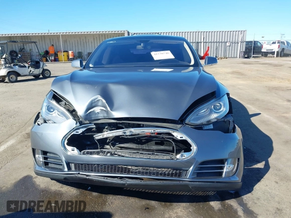 2014 Tesla Model S 60 with VIN 5YJSA1S10EFP32851, listed as a IAAI auction lot 41730746 with 91,657 mi miles and . Bid and sale history available at DreamBid. Image 12.